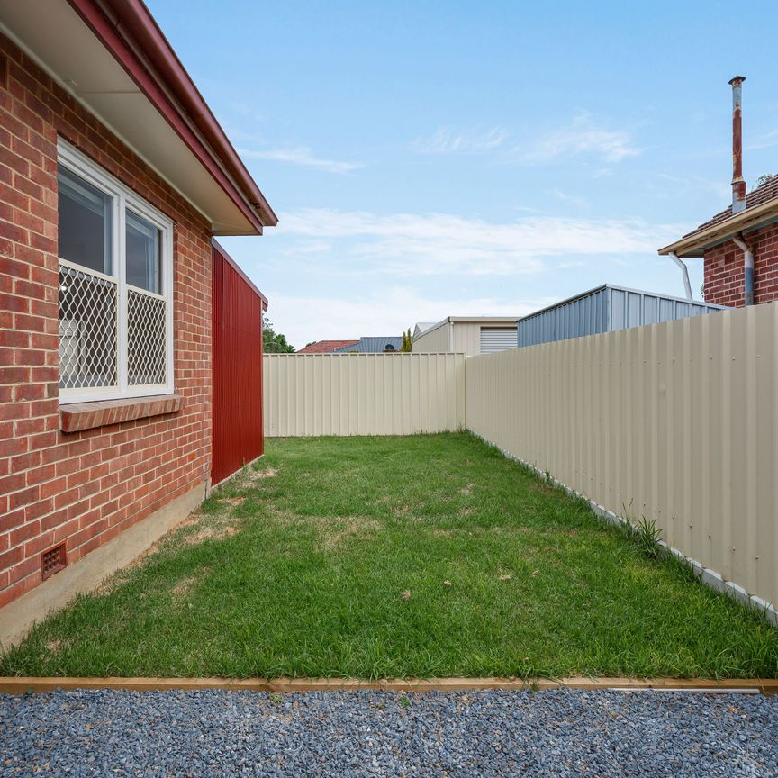 Charming 3-Bedroom House with Spacious Backyard - Photo 1