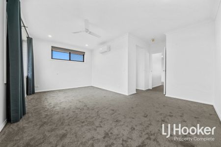 Sought After 5-Bedroom Home - Brand New - Large Corner Block with Side Access - Photo 4