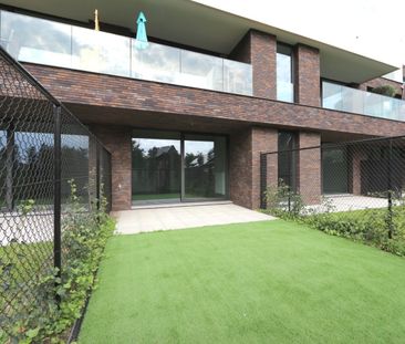 Gelijkvloers appartement met zuid gerichte tuin! - Foto 1