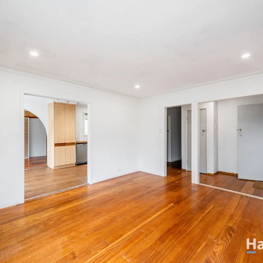 “Light-Filled Corner Home by the Trail.” - Photo 1