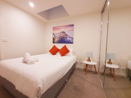 Furnished Penthouse with Unobstructed City Views - Photo 4