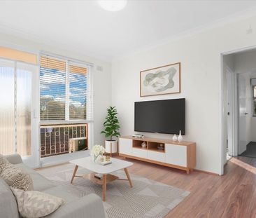 RENOVATED TOP FLOOR UNIT WITH AIRCON - Photo 1
