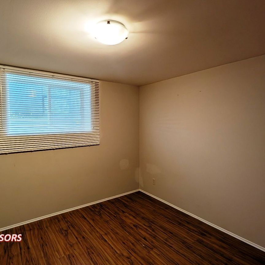 SPACIOUS 4 BED, 2 BATH, BUNGALOW HOME WITH A DOUBLE DETACHED GARAGE IN THE COMMUNITY OF CAPITAL HILL - Photo 1