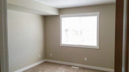 Bright & Spacious 2 Bedroom Apartment In Chestermere’s Lake Community. - Photo 3