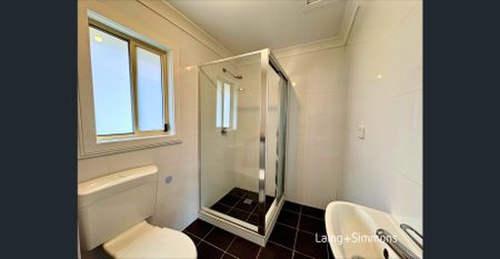 Modern two-bedroom home with water included - Photo 3