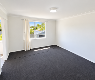 FRESHLY RENOVATED THREE BEDROOM HOME - Photo 1