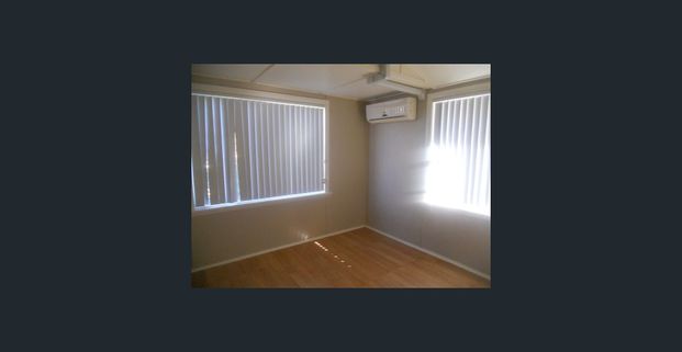 Excellently located 2 bedroom unit - Photo 1