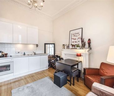 A raised ground floor studio room on Cranley Gardens with its own k... - Photo 1