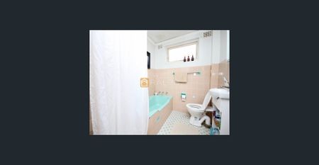 Front facing, 2 bedroom residence with a lock up garage - Photo 5