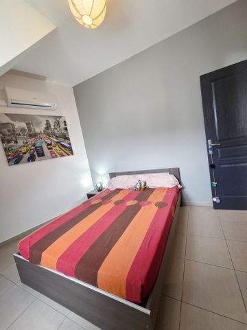 Location Appartement 4 pièces 81m² ST DENIS 97400 - Photo 4