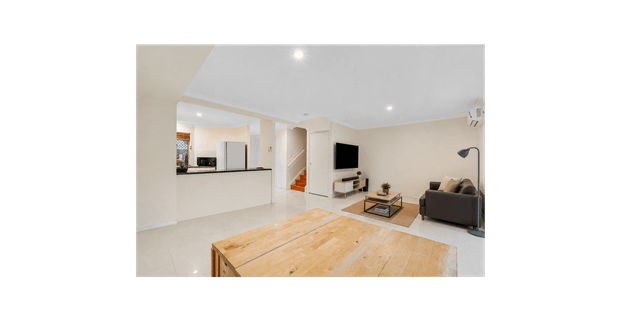 Two-Level Townhouse in an Ultra-Convenient Location - Photo 1