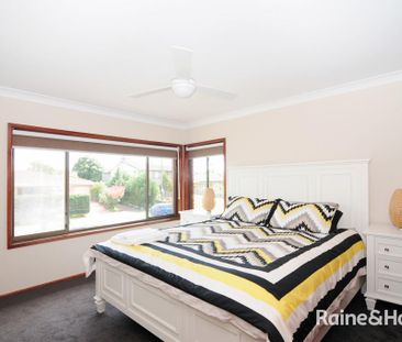 coastal living meets space and comfort in this family home - Photo 5