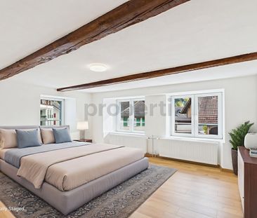 Generous corner townhouse with studio, sunny balcony and mountain view - Photo 6