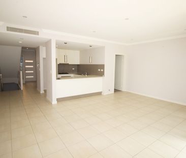 Quiet Secure Tri-level Townhouse with Distant City View & Internal ... - Photo 3