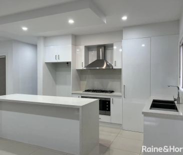 “Modern Living in a Thriving Location!” - Photo 6