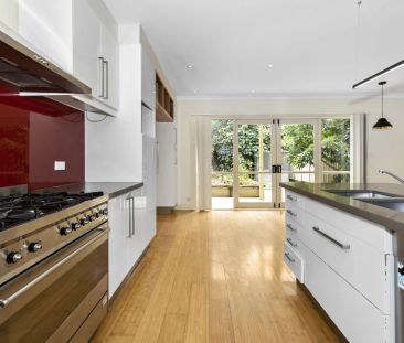Charming Three-Bedroom Townhouse - Photo 1