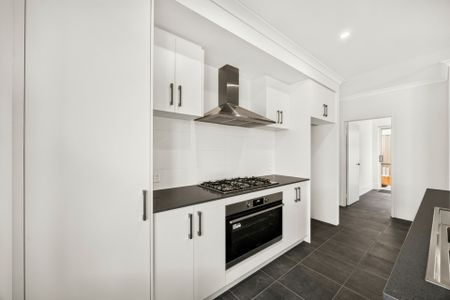 Brand New Fully Landscaped Four-Bedroom Home! - Photo 2