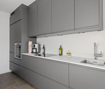 Gelijkvloers appartement met terras en tuin. - Foto 6