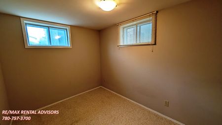 SPACIOUS 4 BED, 2 BATH, BUNGALOW HOME WITH A DOUBLE DETACHED GARAGE IN THE COMMUNITY OF CAPITAL HILL - Photo 2