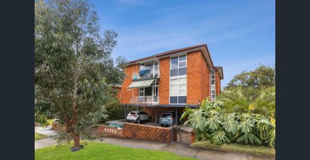 Sunny Top-Floor Retreat Offering Convenience and Coastal Living - Photo 3