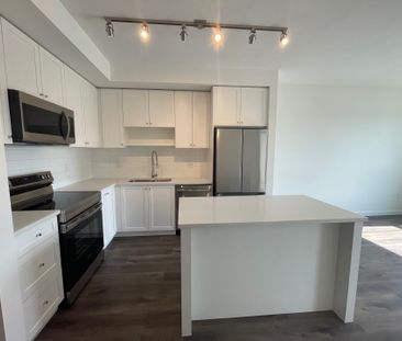 Unit 201- Beautifully Designed/ 2 Bedroom Plus Den Condo at The Grove - Photo 2