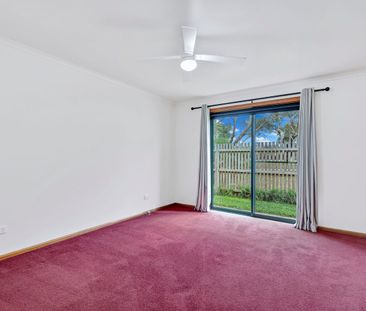 Charming 3-Bedroom Unit with Double Garage and Outdoor Deck - Photo 3