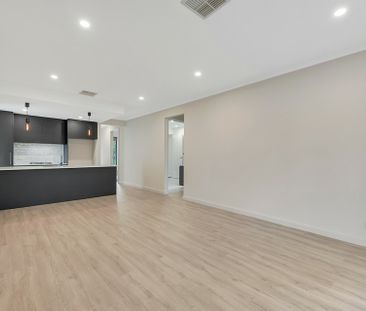 Low-Maintenance, Modern Living in Ultra-Convenient Location - Photo 1