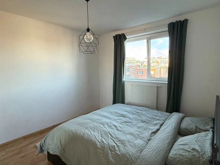 Lichtrijk 2-slaapkamerappartement met terras - Foto 4