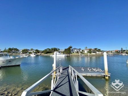 Stunning Canal-Front Home with Pontoon â Convenience Meets Lifestyle - Photo 3