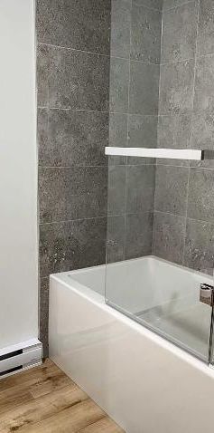 4 1/2 - CONDO NEUF ** 1 MOIS GRATUIT** - Photo 1
