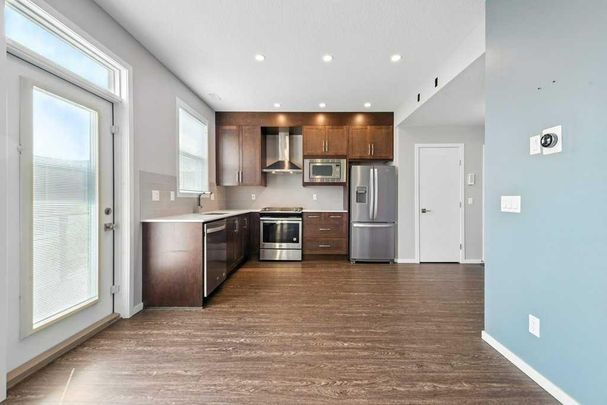 Quiet & Contemporary 3 Bed Townhouse | Close To Cross Iron Mall. Garage & A/C Included - Photo 1