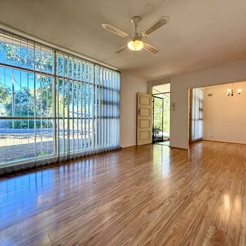 Spacious Family Home with Generous Yards in Prime Location! - Photo 1