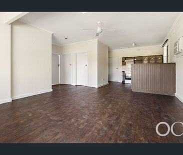 Open the door to easy living by the coast - Photo 4