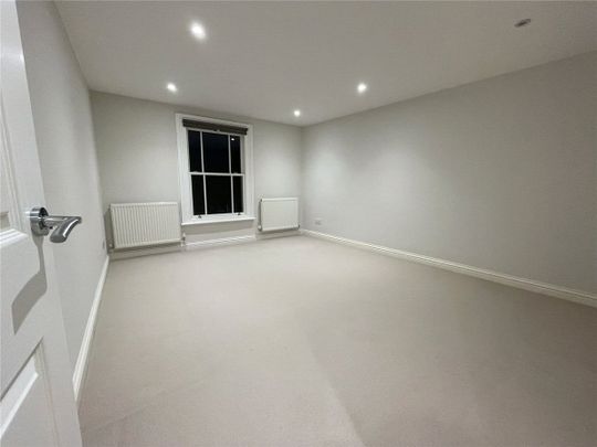 2 bedroom first floor maisonette with private patio and parking, on the High Street. - Photo 1