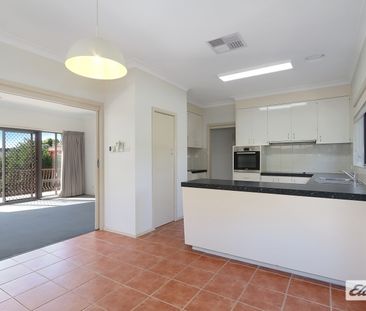 Spacious Two-Story Home with Versatile Layout! - Photo 1
