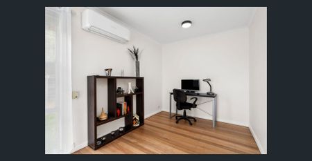 Comfortable Living in Prime Location with Bonus Studio! - Photo 3