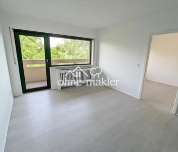 Exklusive 2,5-Zimmerwohnung mit herrlichem Blick ins Grüne mit TG-S... - Photo 1