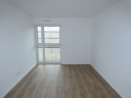 Neubau/Erstbezug: Modern geschnittene 3-Zimmer-Wohnung mit traumhaftem Ausblick - Photo 4