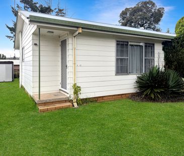 Charming 1-Bedroom Unit with Spacious Yard - Photo 4