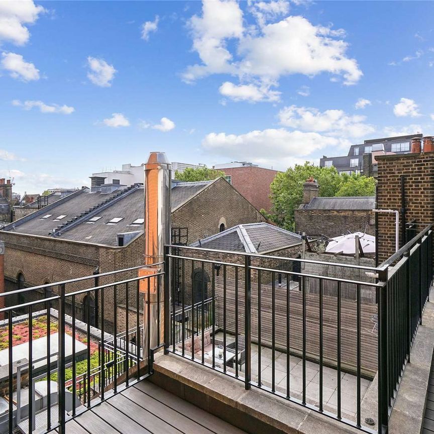 Arranged over two floors, a stunning three bedroom property with two private terraces. - Photo 1