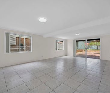 A charming home set on a generous block with a sprawling backyard. - Photo 5