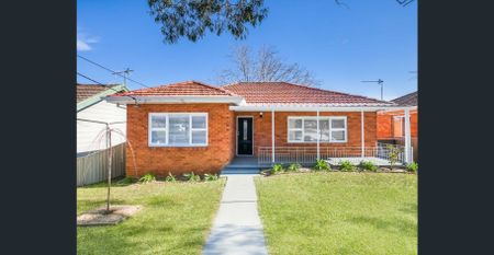 Modern Family Home with Spacious Backyard - Photo 2