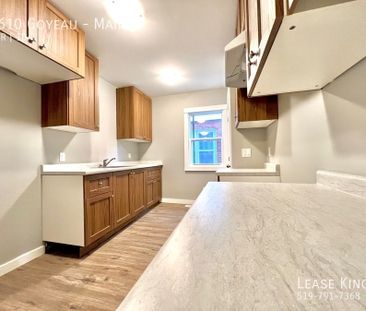 Completely Renovated 4 Bedroom 1 Bathroom Main Floor Unit - Photo 1