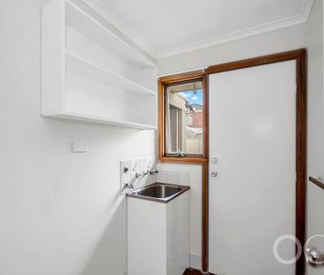 Open the Door to Comfortable Family Living in a Spacious Burton Home - Photo 3