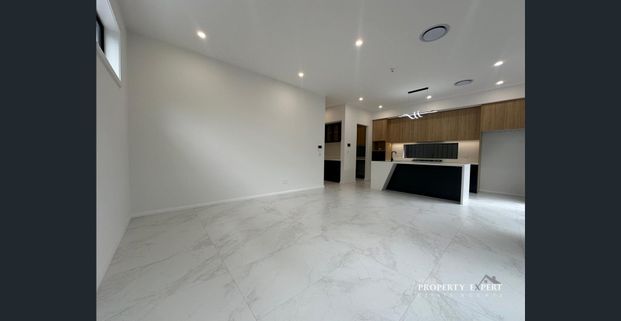 Spacious Modern Home with Custom Features in Elara! - Photo 1