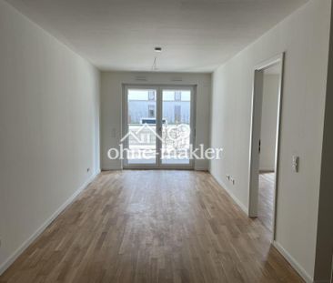 Erstbezug: 2-Zimmer-Wohnung mit EBK, Badausstattung und Kelleranteil - Foto 1