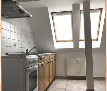 Gemütliche 2,5-Zimmer-Dachwohnung mit EINBAUKÜCHE im Niedrigenergie... - Photo 1