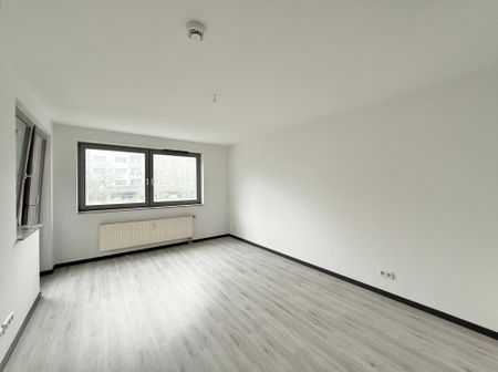 Schöne 3-Zimmer-Erdgeschosswohnung mit Balkon in zentrumsnaher Lage - Photo 3