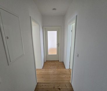 Schicke 3-Zimmer-Wohnung mit Dielenboden in modernem Wohnhaus - Foto 1