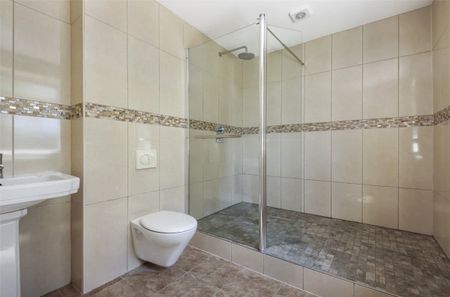 A four bedroom detached bungalow with allocated parking for 2 cars situated in Barlborough. - Photo 2